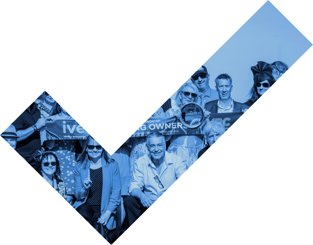 Racegoers and community members celebrating together at a race day event